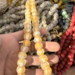13e2d481-4944-4322-add1-52a74e919a24 Authentic Recycled Glass Krobo Beads Strand: Clear & Orange